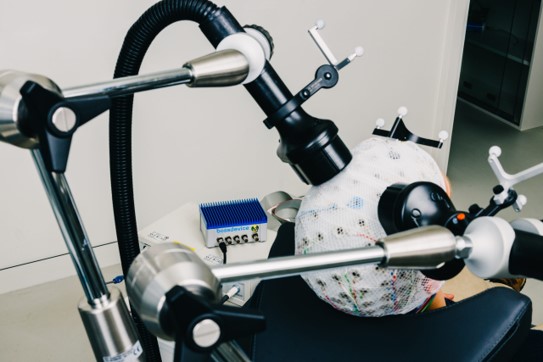 SYNC2BRAIN - From Research to Certified Clinical TMS Therapy on a Speedgoat Target Machine Platform